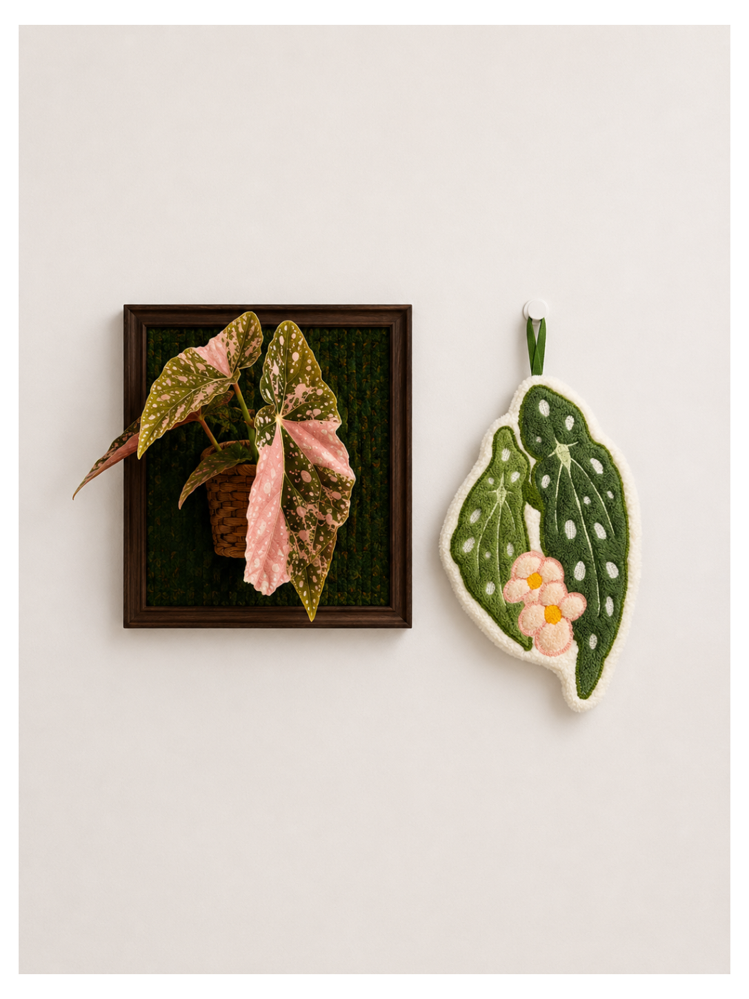 Paw&Leaf leaf-shaped hand towel in green and pink botanical design beside framed plant wall art