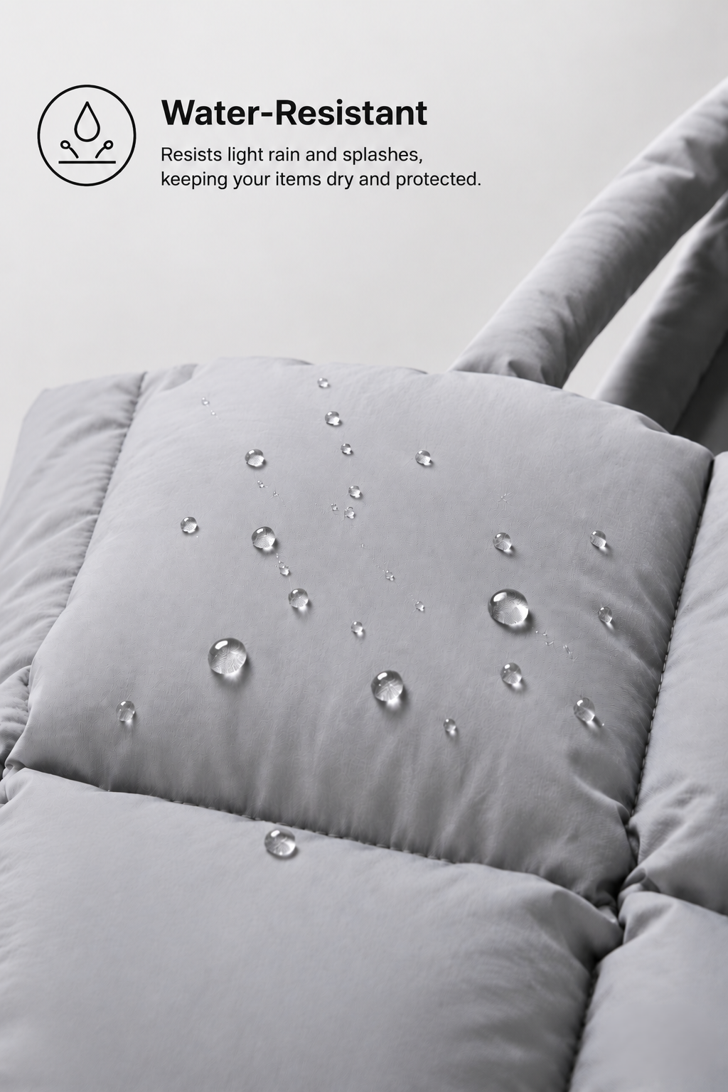 Soft Puffer Tote Bag - close-up of water-resistant quilted puffer fabric texture in gray