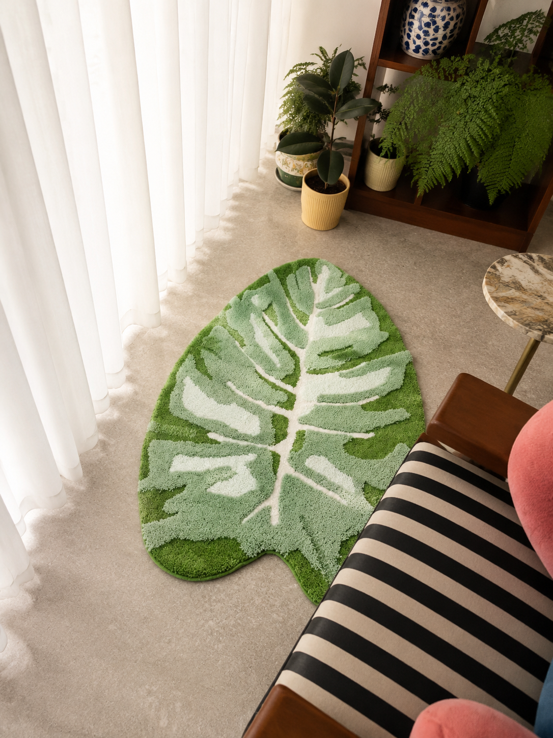 Tufted Plant Rug - monstera leaf-shaped rug on floor in cozy room corner with houseplants
