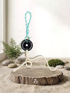 Mini Plate Bag Charm - Capricorn zodiac charm, black weight plate keychain on wood display