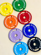 Mini Plate Bag Charm - color options grid showing mini barbell plate charms in 8 colors