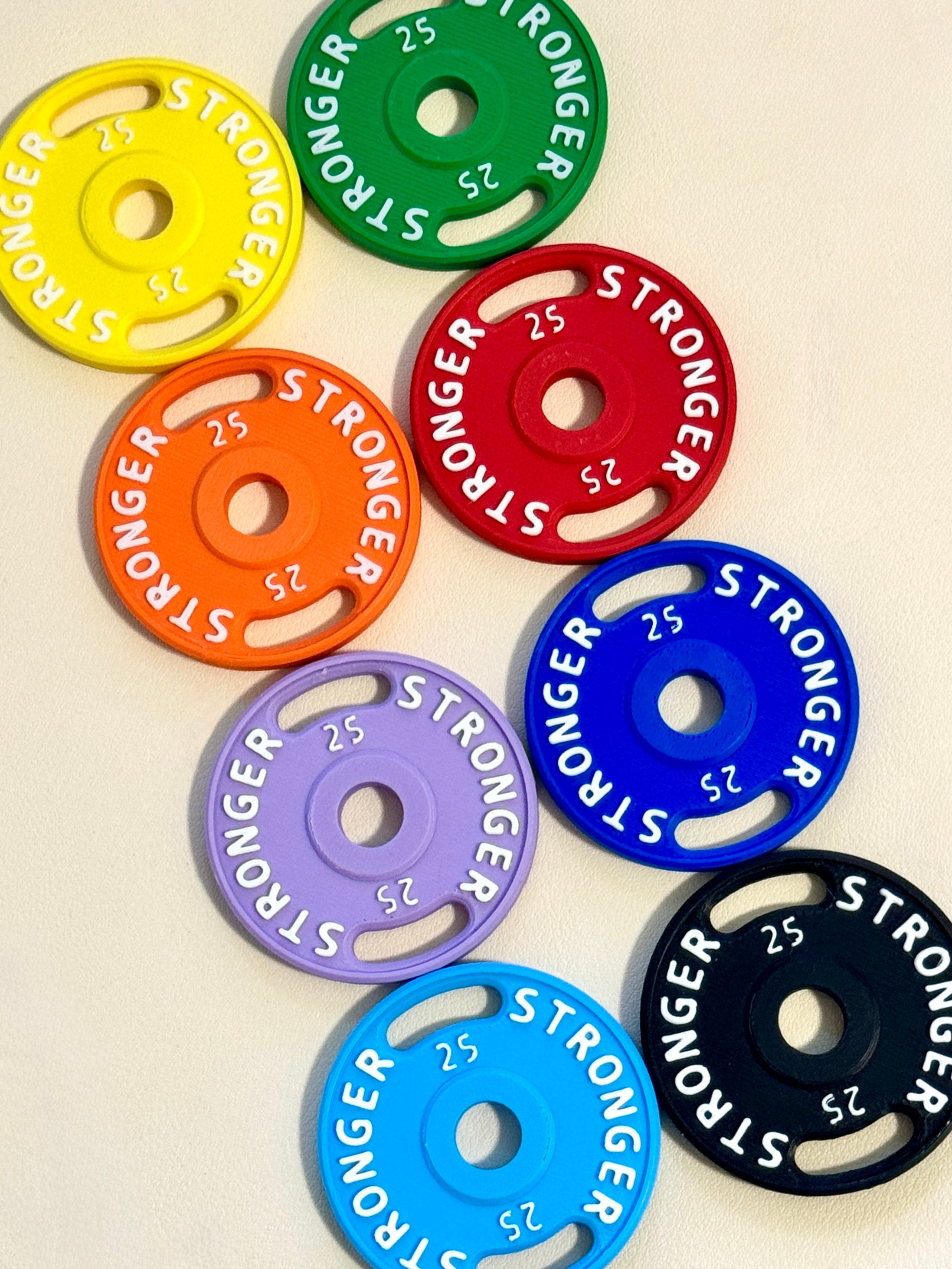 Mini Plate Bag Charm - color options grid showing mini barbell plate charms in 8 colors