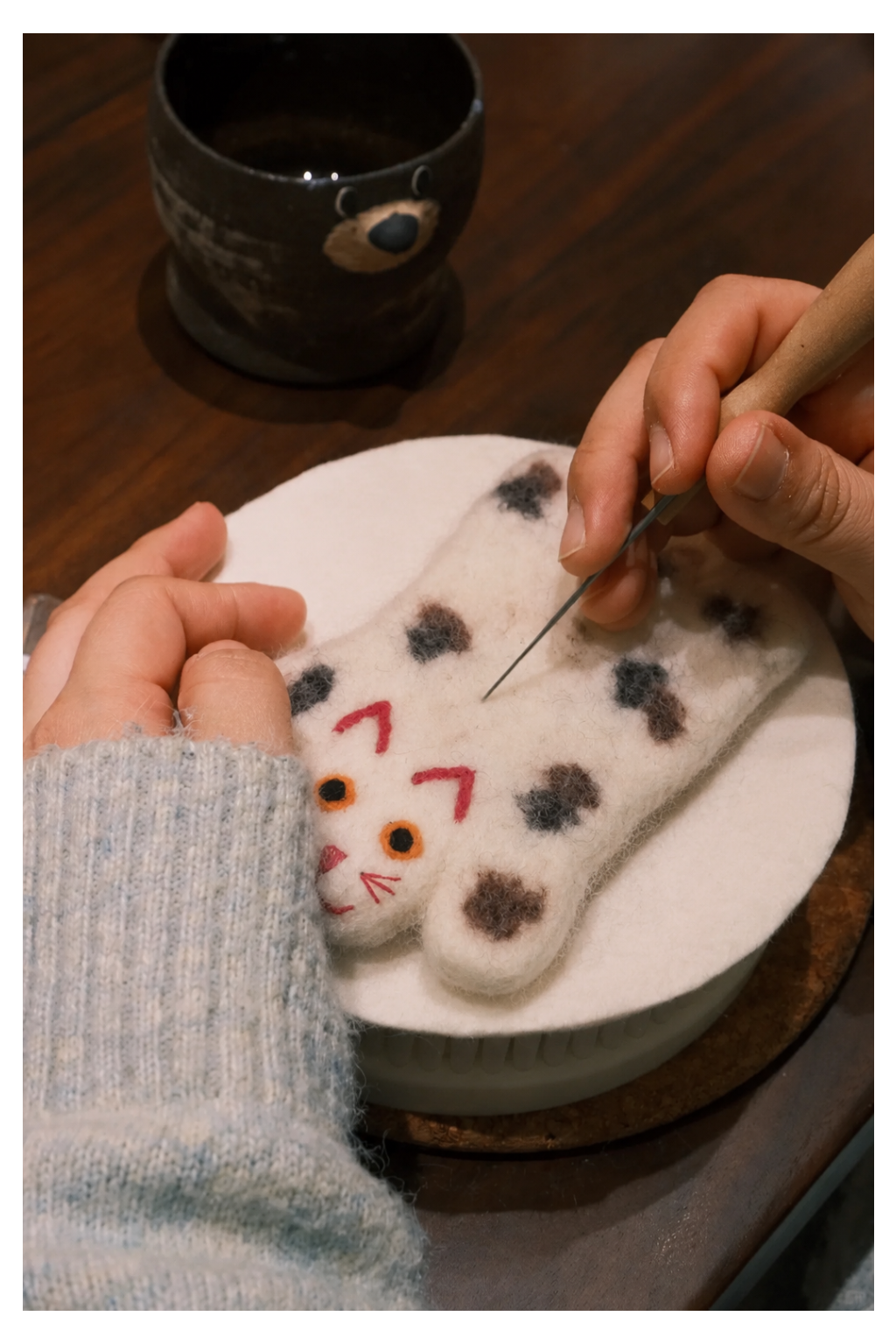 Wool Felt Animal Coaster - hand-felting a spotted cat design coaster with needle felting tool