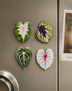 Mini Botanical Magnet Set - four heart-shaped leaf fridge magnets on stainless steel refrigerator