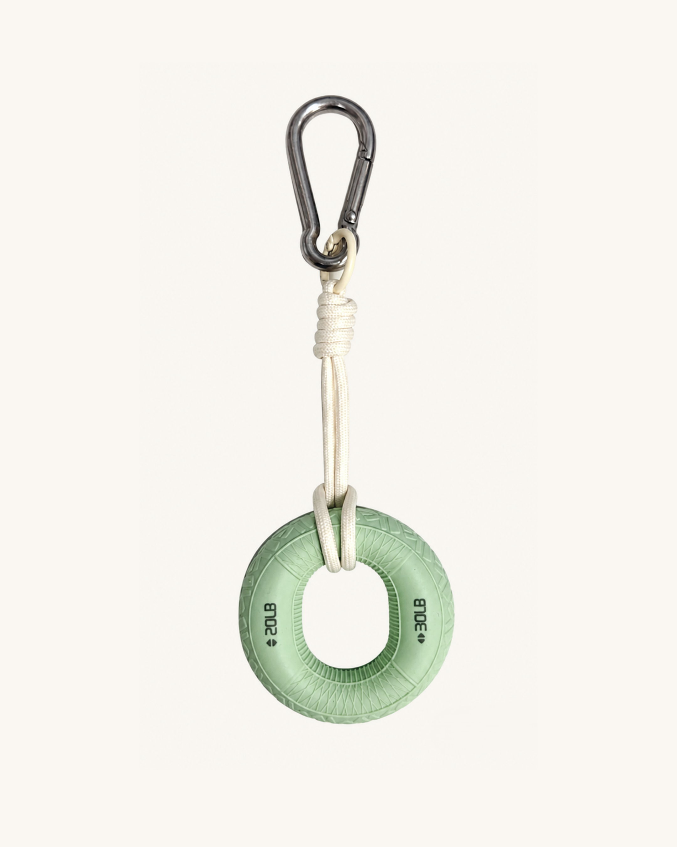 Boulder Grip Charm in light green - donut-shaped climbing grip keychain with rope and carabiner