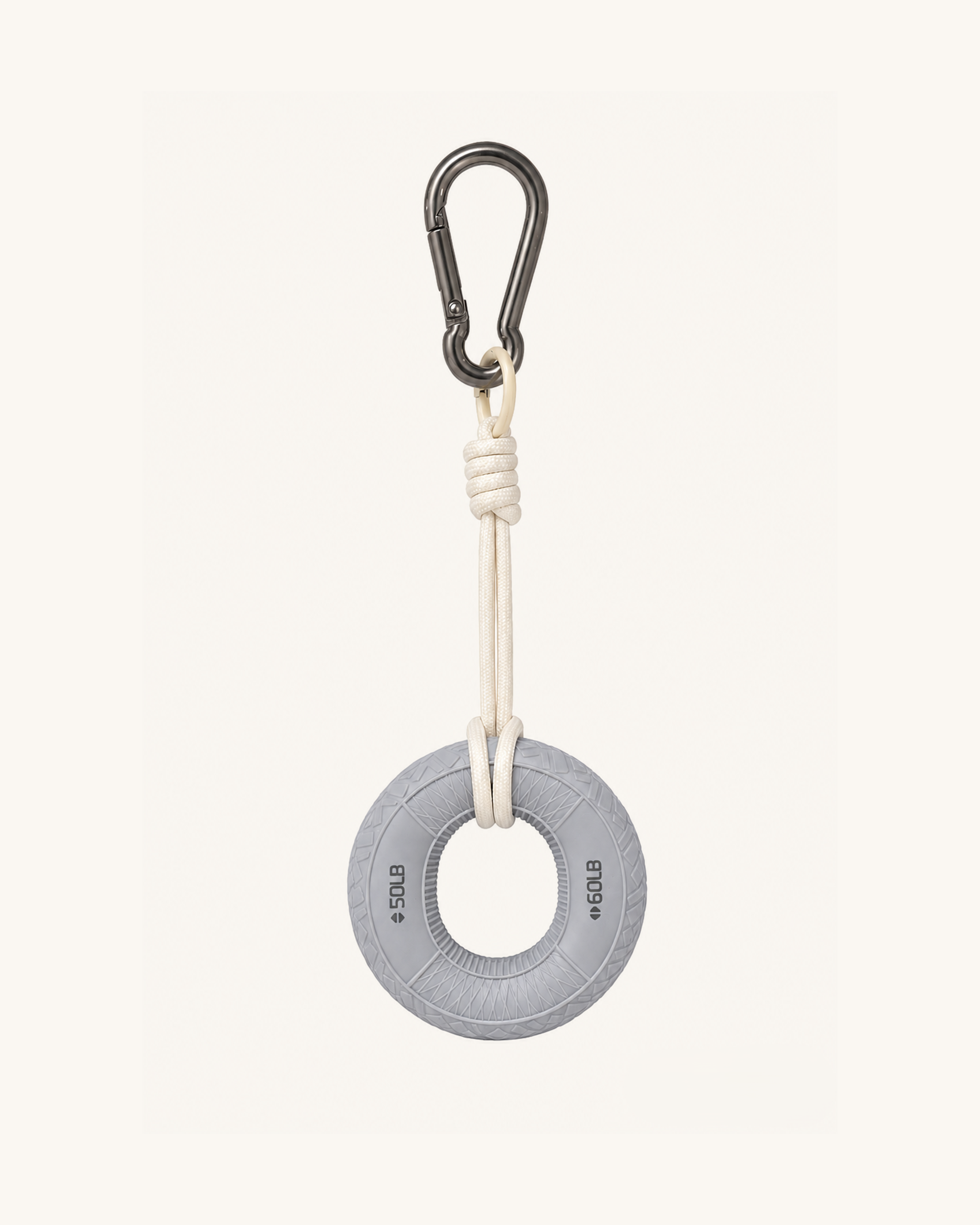 Boulder Grip Charm in grey - donut-shaped climbing grip keychain with cream rope and carabiner