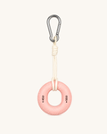 Boulder Grip Charm in pink - inflatable donut-shaped climbing grip keychain with cream rope and carabiner