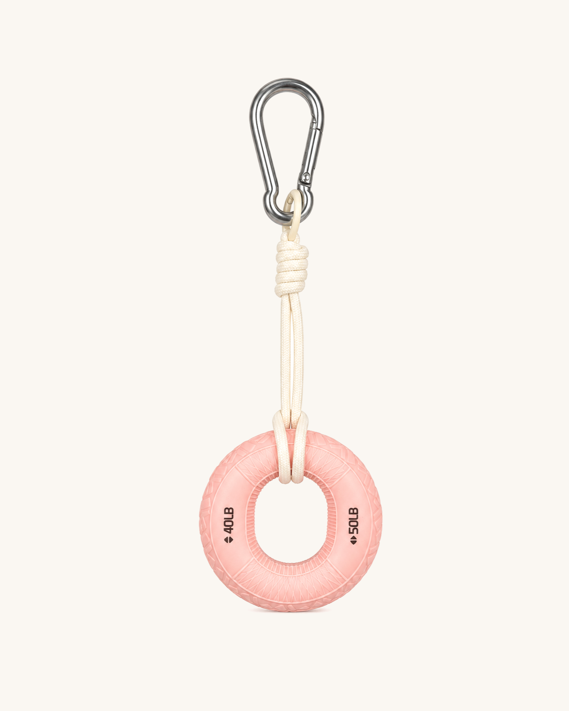 Boulder Grip Charm in pink - inflatable donut-shaped climbing grip keychain with cream rope and carabiner